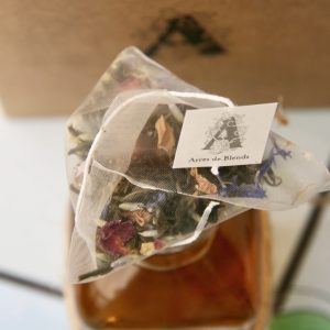 bolsa con té verde con logo de ayres